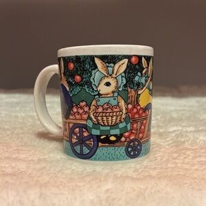 Vintage Whimsical Rabbits with hats Mug  carrying Apples on a carriage